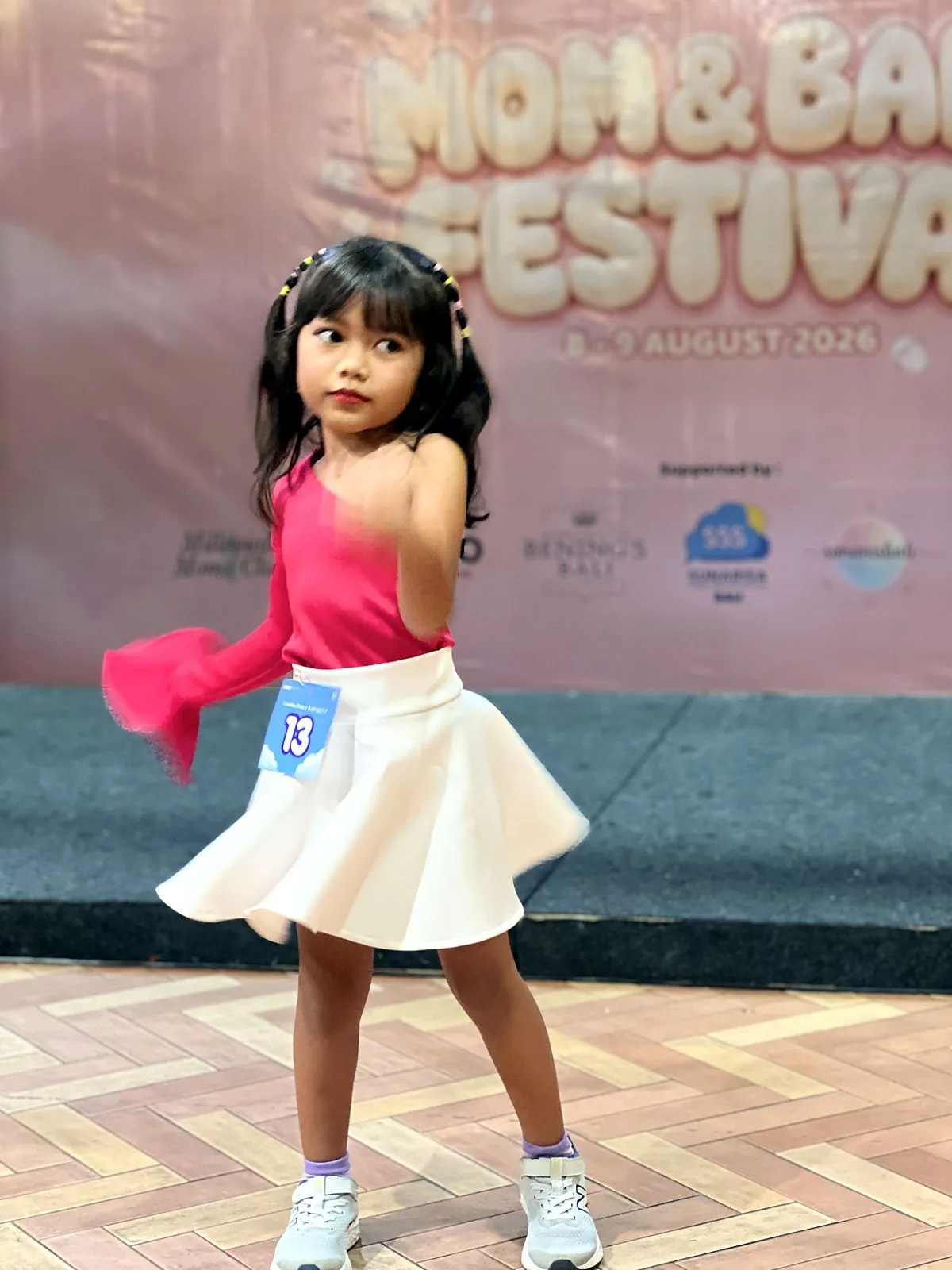 Striking a pose on stage – Mom & Baby Festival